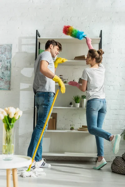 Selective Focus Girl Man Cleaning Rack Shelves Home — Stock Photo, Image