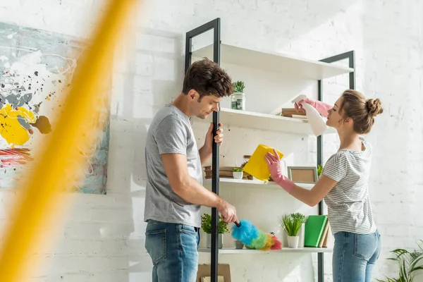Selective Focus Girl Handsome Man Cleaning Rack Shelves — Stock Photo, Image