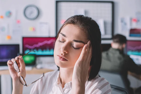 Selective Focus Tired Data Analyst Touching Head While Colleague Working — Stock Photo, Image