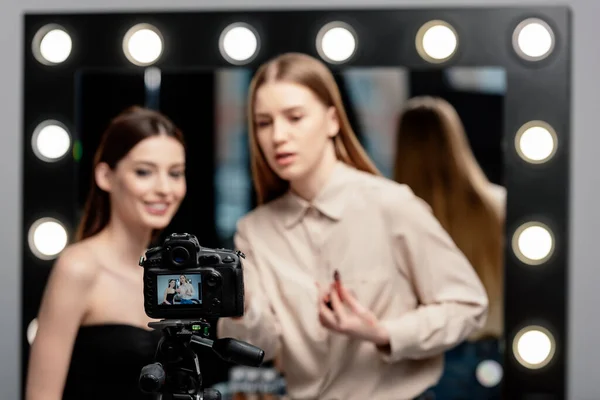 Selective Focus Digital Camera Makeup Artist Holding Lip Gloss Positive — Stock Photo, Image