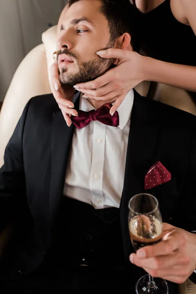 Cropped View Woman Touching Face Handsome Man Holding Glass Champagne — Stock Photo, Image