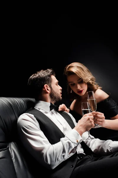 Attractive Woman Elegant Man Clinking Champagne Glasses While Sitting Leather — Stock Photo, Image