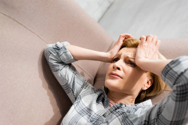 Mature Woman Suffering Headache While Lying Sofa — Stock Photo, Image