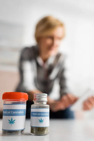 Selective Focus Bottles Medical Cannabis Lettering Mature Woman — Stock Photo, Image