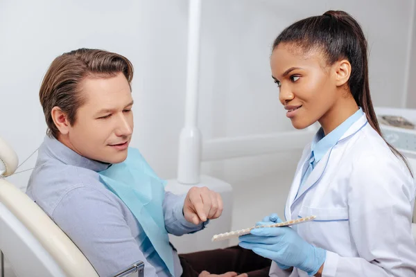 Man Pointing Finger Teeth Palette Happy African American Dentist Latex — Stock Photo, Image