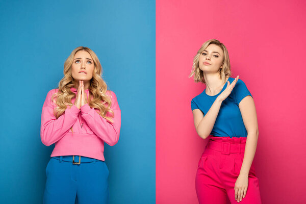 Blonde girls showing shop and hope gestures on pink and blue background