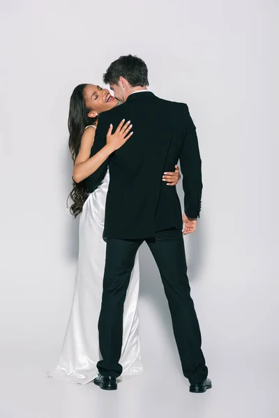 Full Length View Happy African American Bride Embracing Elegant Groom — Stock Photo, Image