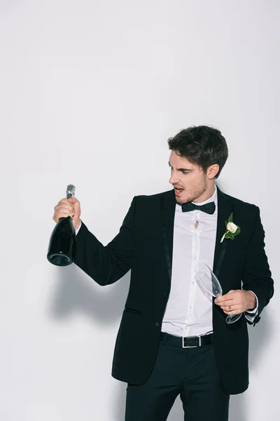 Happy Bridegroom Holding Champagne Bottle Glass White Background — Stock Photo, Image