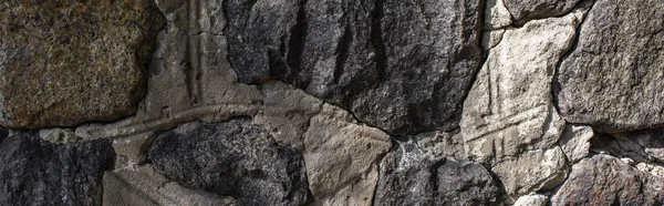 Textura de piedra y hormigón al sol, plano panorámico - foto de stock