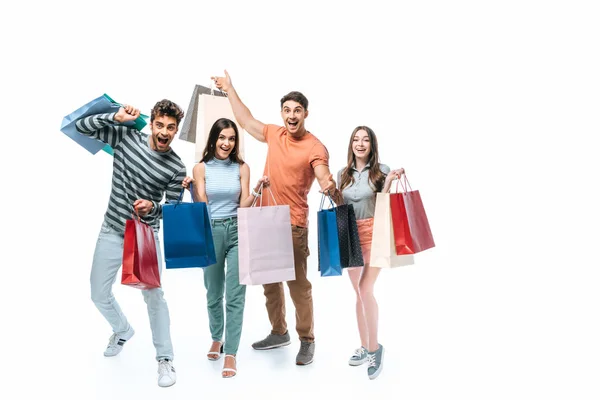 Emotional friends with shopping bags together, isolated on white — Stock Photo