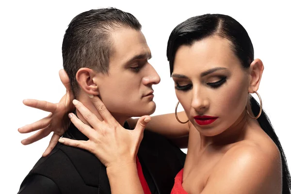 Dançarino apaixonado tocando pescoço de parceiro sensual durante a realização de tango isolado no branco — Fotografia de Stock