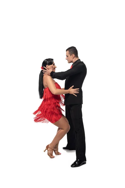 Casal apaixonado de dançarinos realizando tango no fundo branco — Fotografia de Stock