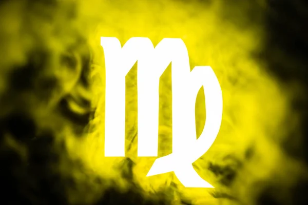 Yellow illuminated Virgo zodiac sign with smoke on background — Stock Photo