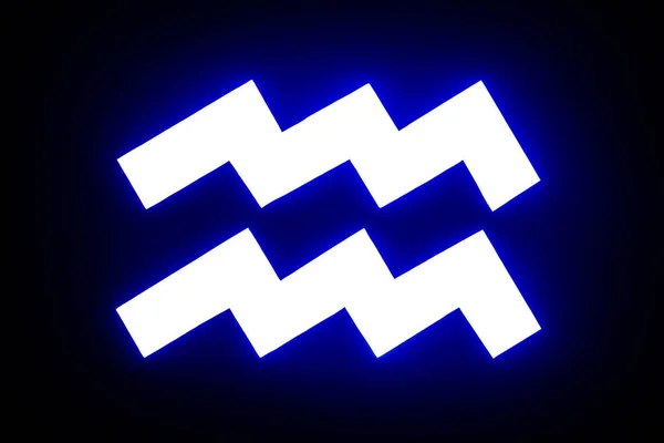 Signe lumineux bleu du zodiaque du Verseau isolé sur noir — Photo de stock