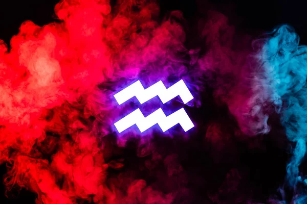 Blue illuminated Aquarius zodiac sign with colorful red smoke on background — Stock Photo