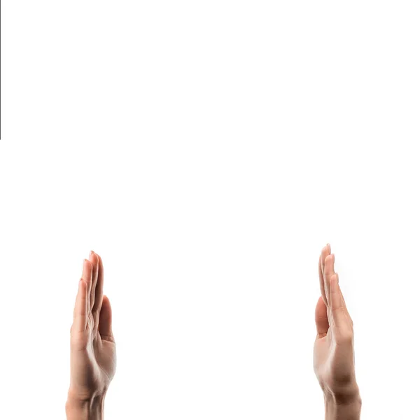 Abgeschnittene Ansicht einer Frau mit erhobenen Händen, isoliert auf Weiß — Stockfoto