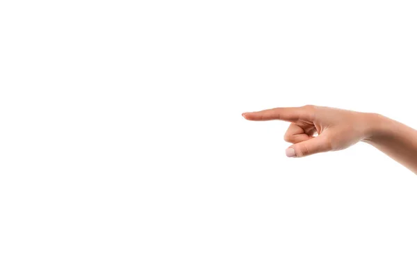 Vista recortada de la mujer señalando con el dedo aislado en blanco - foto de stock