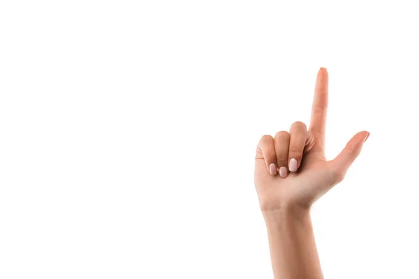 Recortado vista de chica señalando con el dedo aislado en blanco - foto de stock