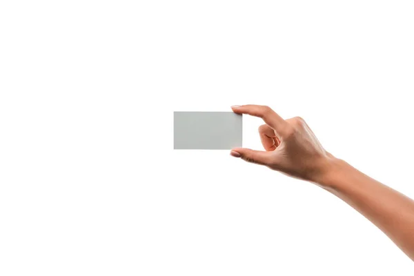 Cropped view of girl holding empty card isolated on white — Stock Photo