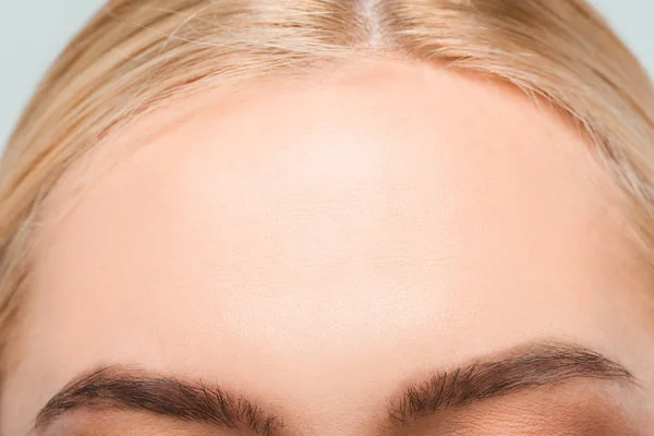 Close up of forehead with perfect skin of young woman — Stock Photo