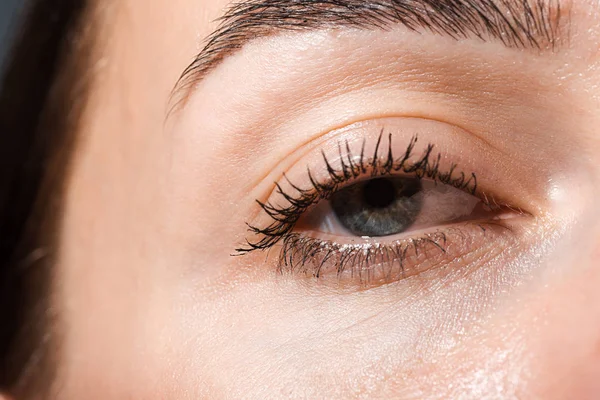 Cropped view of woman looking at camera — Stock Photo