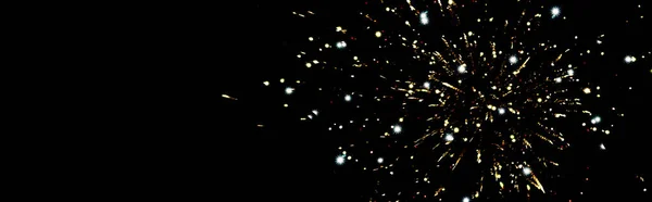 Panoramic shot of golden fireworks in night sky, isolated on black — Stock Photo