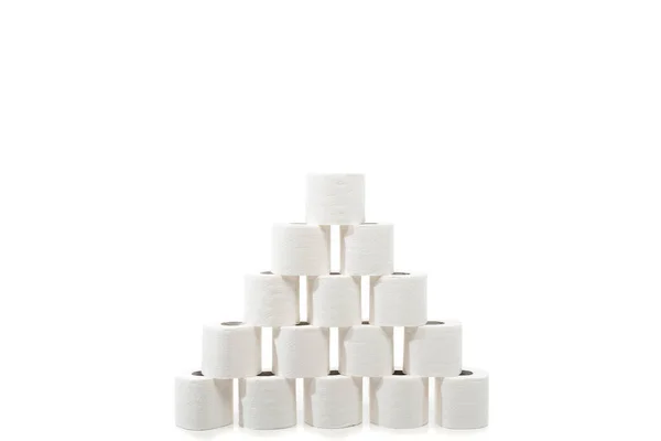 Rolls of toilet paper arranged in pyramid isolated on white — Stock Photo
