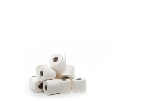 Rouleaux de papier hygiénique en pile isolés sur blanc — Photo de stock