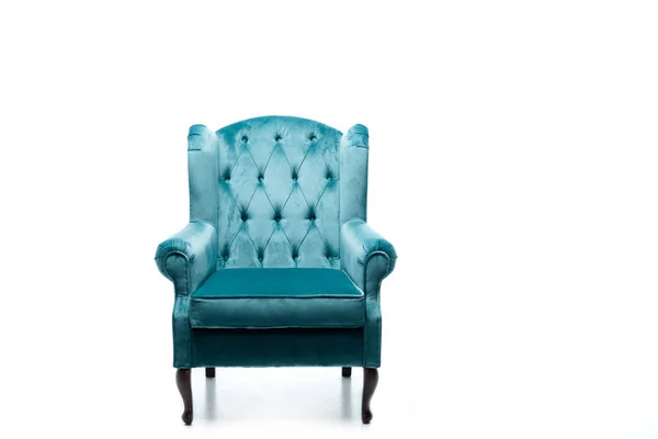 Elegant velour blue armchair with pillow isolated on white — Stock Photo