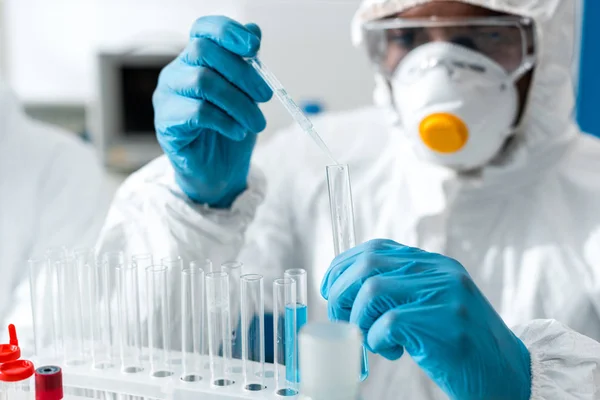 Selective focus of african american scientist doing dna test — Stock Photo
