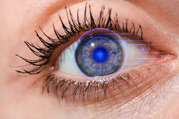 Cropped view of young woman with grey eye looking at camera, internet security concept — Stock Photo