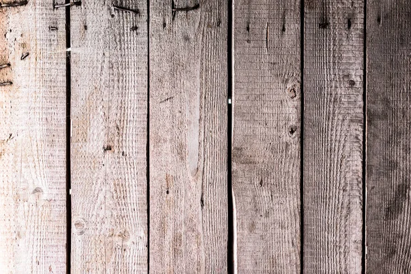 Weathered wooden natural textured grey surface with nails — Stock Photo