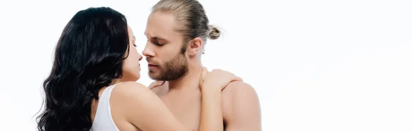 Panoramic shot of sexy couple in white underwear going to kiss, isolated on white — Stock Photo