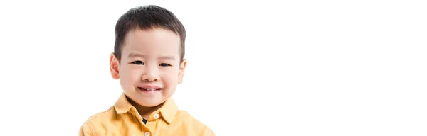 Panoramic shot of cheerful little asian boy isolated on white — Stock Photo