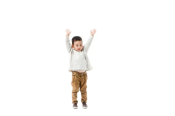 Piccolo asiatico ragazzo jumping isolato su bianco — Foto stock