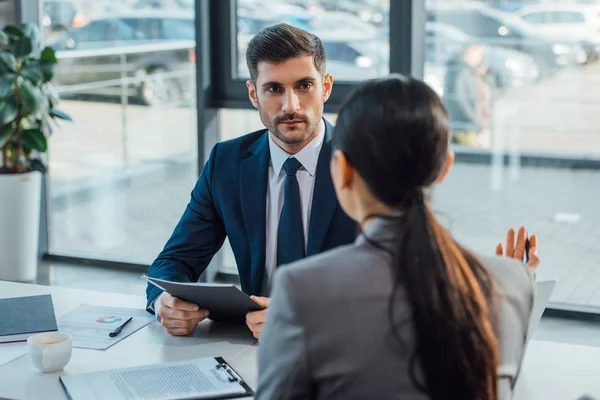 Professional businesspeople talking on meeting in modern office — Stock Photo