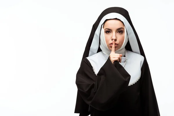 Serious nun showing silence symbol, isolated on white — Stock Photo