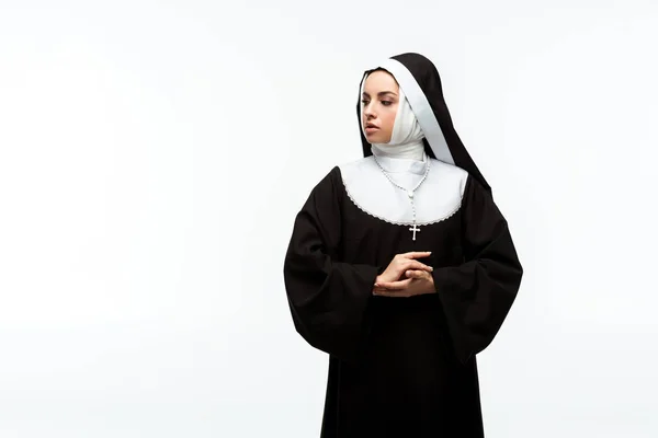 Bela freira pensativa em roupas pretas, isolado em branco — Fotografia de Stock