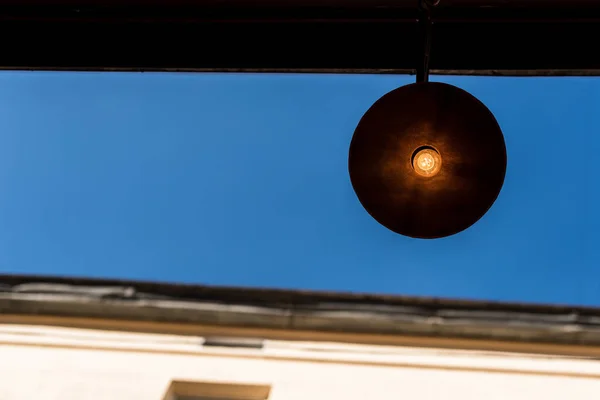 Bottom view of lantern against blue sky — Stock Photo