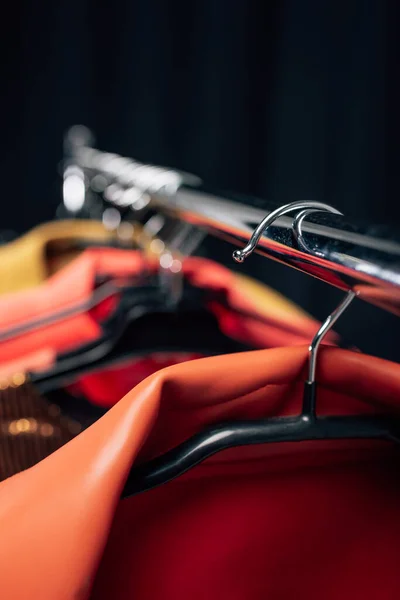 Close up of hanger with stylish jacket on black — Stock Photo