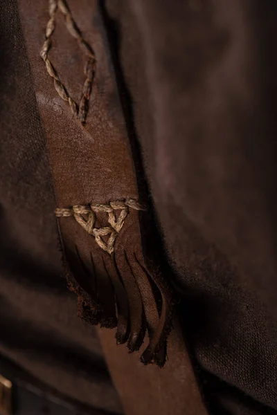 Close up view of medieval Scottish brown leather clothing — Stock Photo