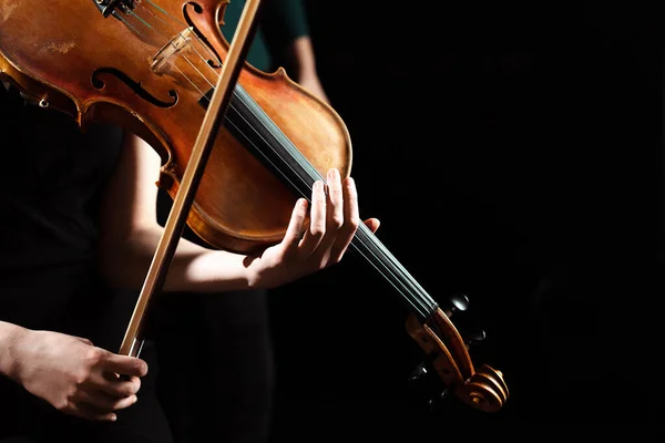 Partial view of female musician performing symphony on violin isolated on black — Stock Photo