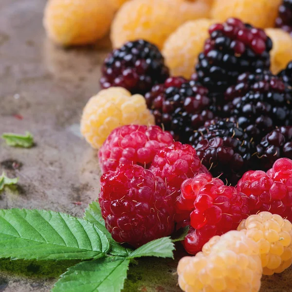 Heap of colorful raspberries — Stock Photo, Image