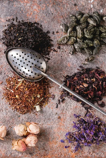 Variety of dry tea with teapot — Stock Photo, Image