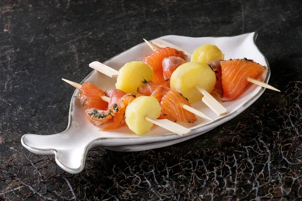 Appetizer with smoked salmon and potatoes — Stock Photo, Image