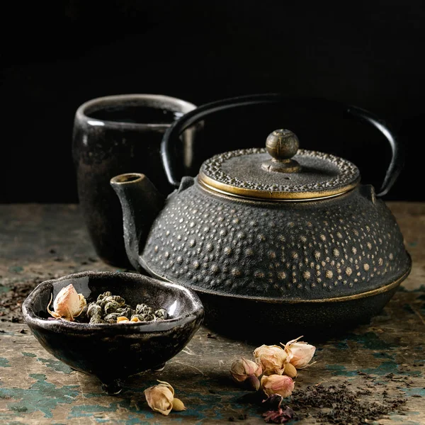 Variety of dry tea with teapot — Stock Photo, Image