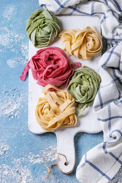 Colored fresh homemade pasta tagliatelle — Stock Photo, Image