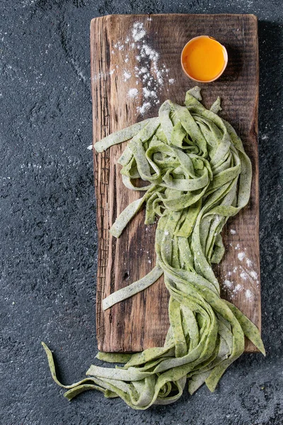 Fresh homemade green pasta tagliatelle