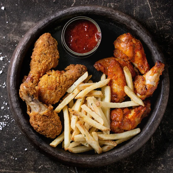 Fried chicken legs with french fries