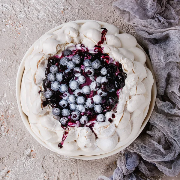 Meringue cake Pavlova with blueberries